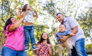 an image of a family having fun in the park